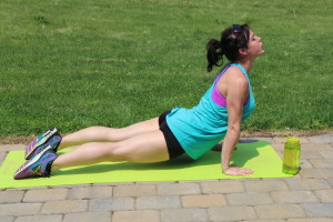 Dive Bomber: Part 3 Press the hips forward. Lift from your lower back, and com into Up Dog position. 