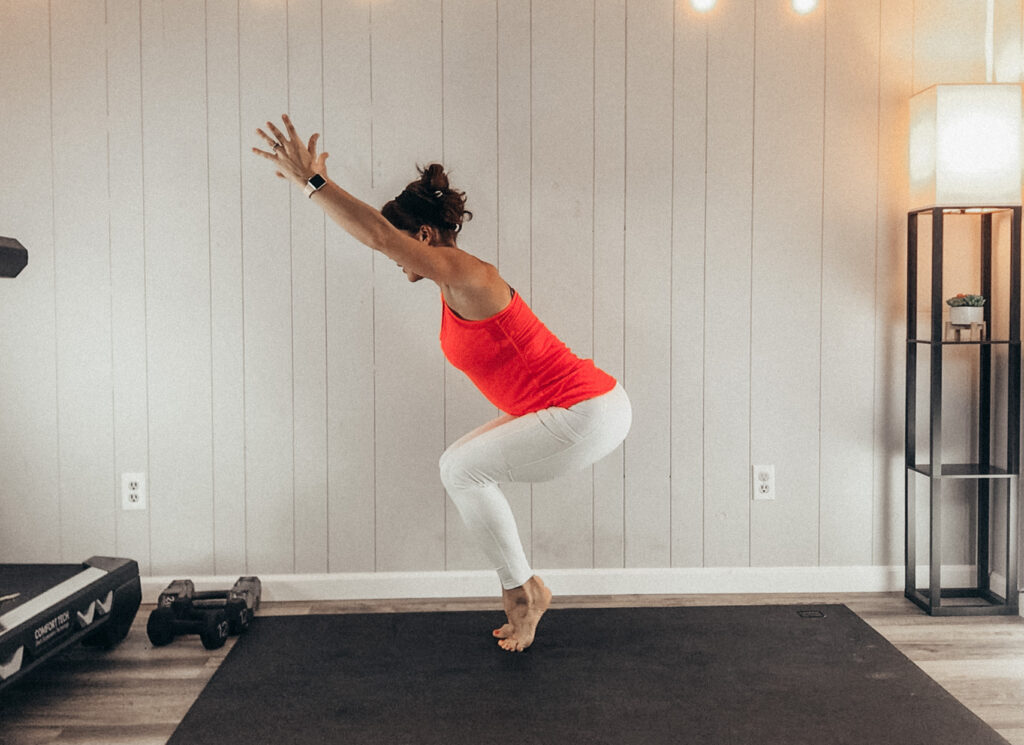 Yoga chair pose with heels lifted