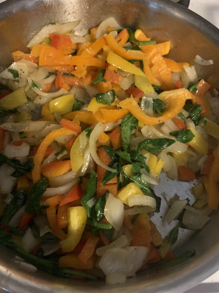 Step 1: In extra virgin olive oil sauté minced garlic, onions, and peppers until soft. Add chopped spinach, oregano, salt and pepper to taste. 
